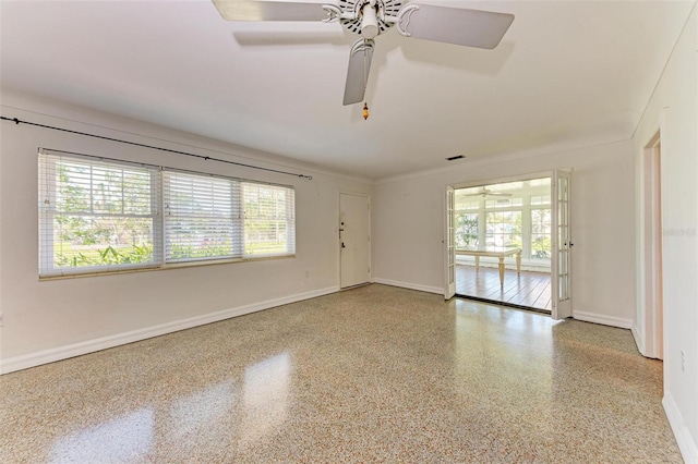 empty room featuring ceiling fan