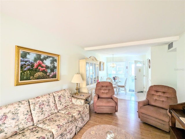 living room with light hardwood / wood-style floors