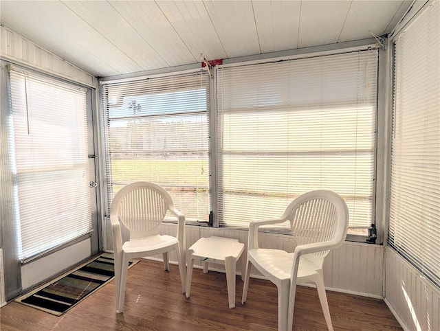 sunroom featuring wood ceiling