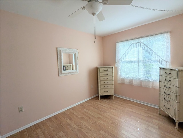 unfurnished bedroom featuring light hardwood / wood-style flooring and ceiling fan