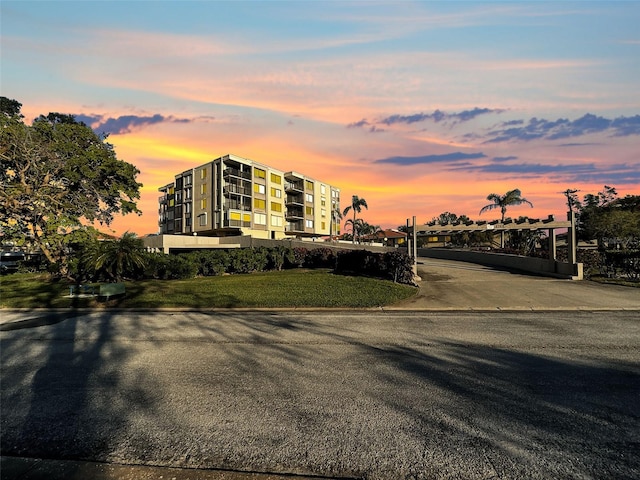 view of outdoor building at dusk