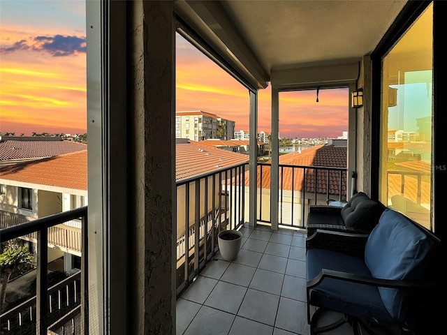 view of balcony at dusk