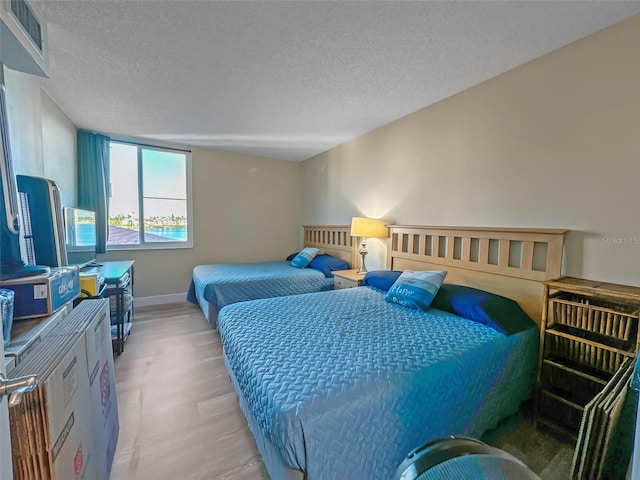 bedroom with a textured ceiling