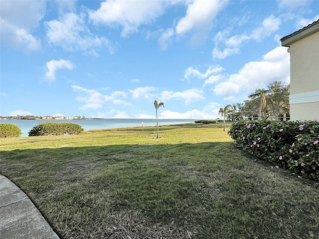 view of yard with a water view