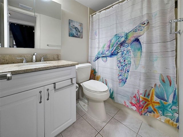 full bath featuring tile patterned flooring, visible vents, vanity, and toilet