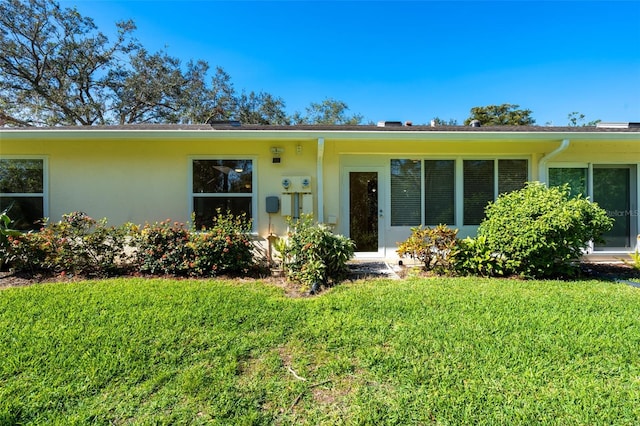 single story home with a front yard