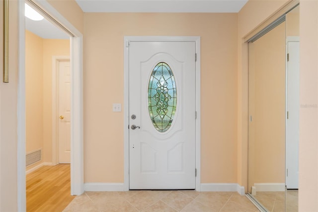 entrance foyer with light wood-type flooring