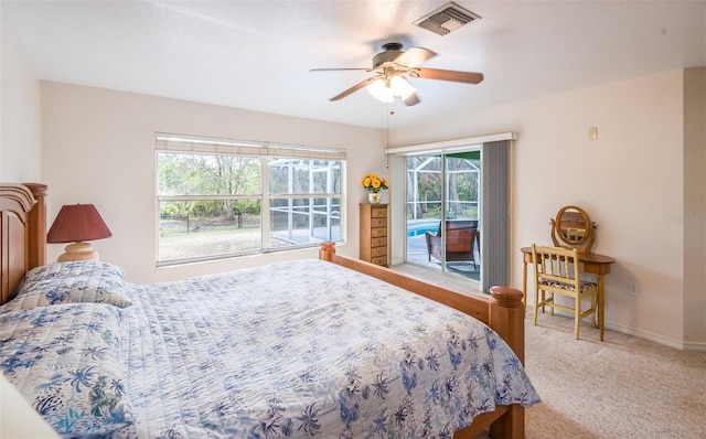 bedroom featuring visible vents, baseboards, a ceiling fan, access to outside, and carpet floors