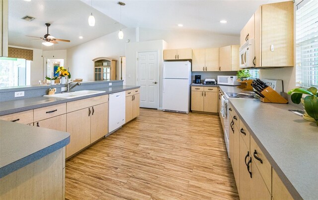 1496 Palm View Rd, Sarasota, FL 34240 - kitchen with white appliances, light brown cabinetry, lofted ceiling, light wood finished floors, and a ceiling fan