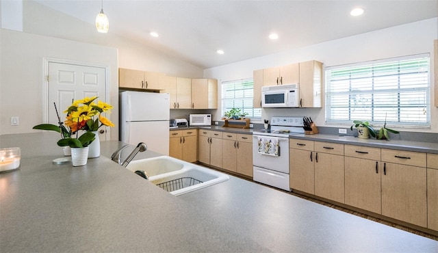 1496 Palm View Rd, Sarasota, FL 34240 - kitchen with white appliances, light brown cabinetry, recessed lighting, lofted ceiling, and hanging light fixtures