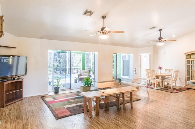 1496 Palm View Rd, Sarasota, FL 34240 - living room with wood finished floors and ceiling fan