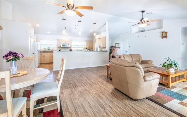 1496 Palm View Rd, Sarasota, FL 34240 - living room with ceiling fan, lofted ceiling, and light wood-style floors