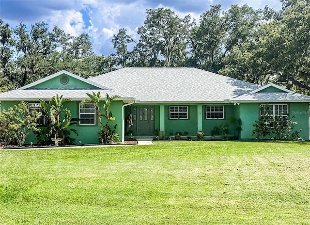 1496 Palm View Rd, Sarasota, FL 34240 - single story home with a front yard, stucco siding, and roof with shingles