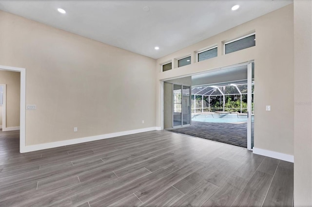 empty room featuring wood-type flooring