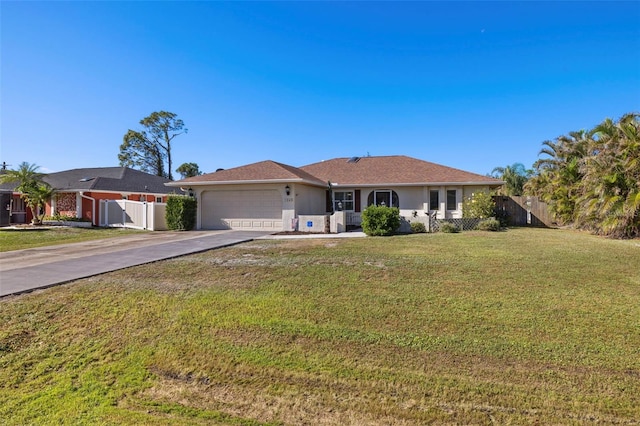 ranch-style house with a garage and a front yard