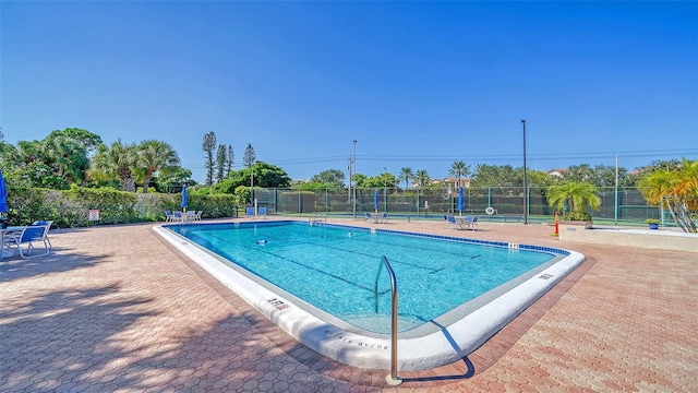 view of swimming pool featuring a patio