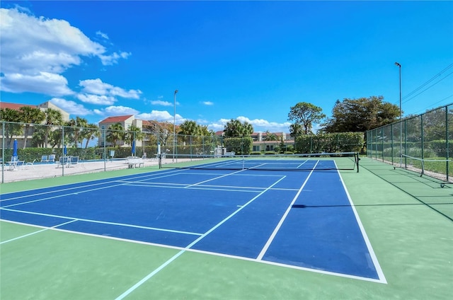 view of sport court featuring basketball court