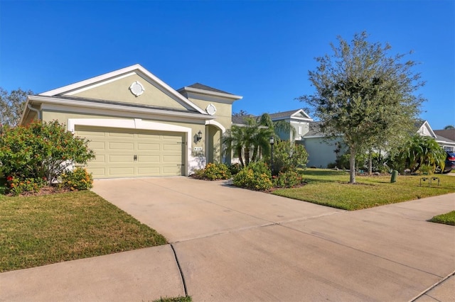 single story home featuring a front yard and a garage