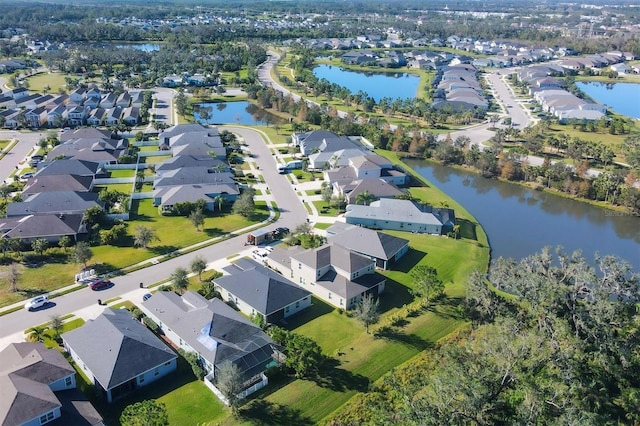 bird's eye view with a water view