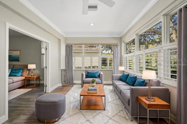 sunroom with ceiling fan