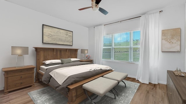 5548 Summit Gln, Bradenton, FL 34203 - bedroom with light wood-type flooring and ceiling fan