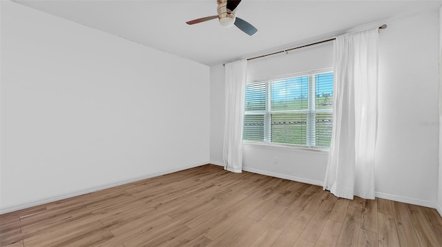5548 Summit Gln, Bradenton, FL 34203 - unfurnished room with light wood-type flooring and a ceiling fan
