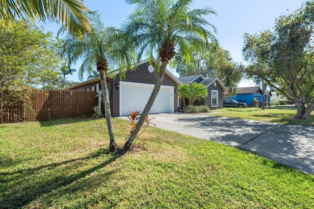 single story home featuring a front yard and a garage