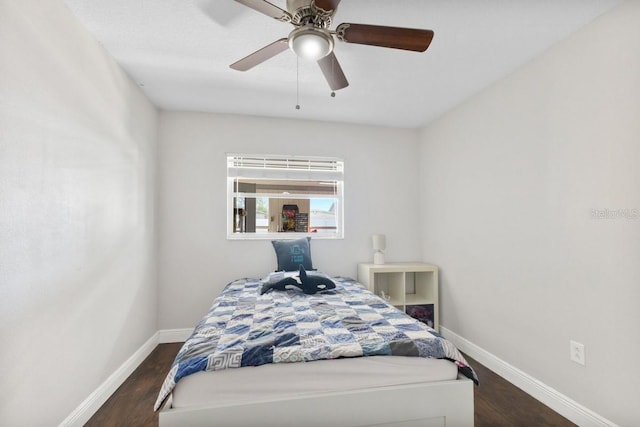 bedroom featuring ceiling fan and dark hardwood / wood-style floors