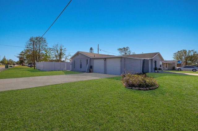 ranch-style home with a garage and a front yard