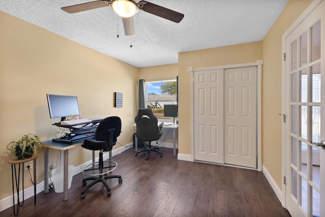 office space with dark wood-type flooring, french doors, and a textured ceiling