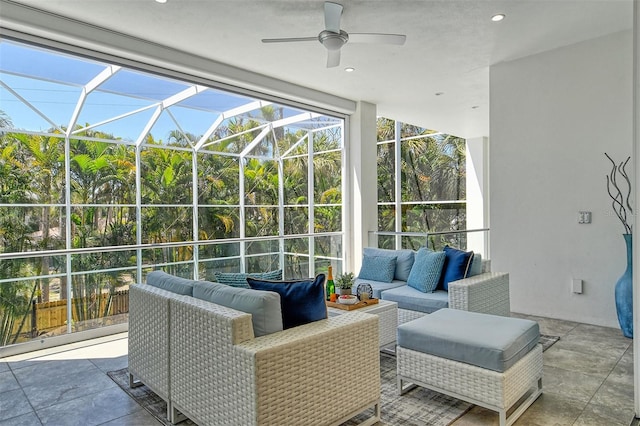 view of patio / terrace featuring a lanai, ceiling fan, and an outdoor hangout area