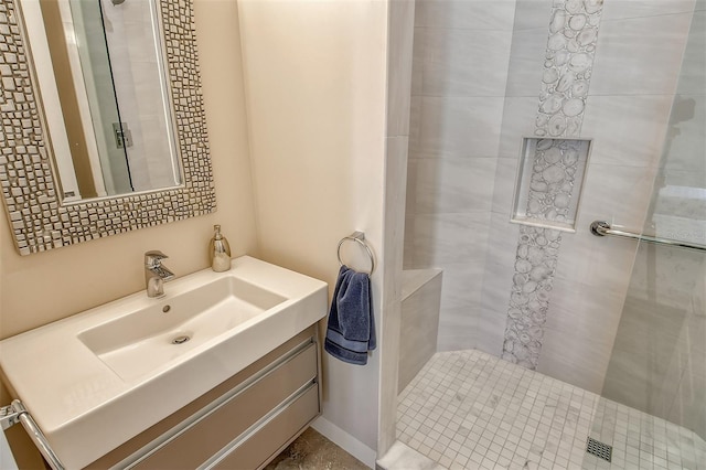 bathroom featuring vanity and walk in shower