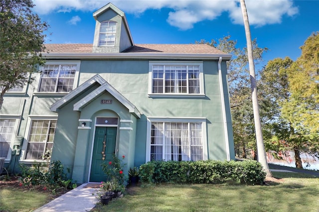 view of front facade with a front lawn