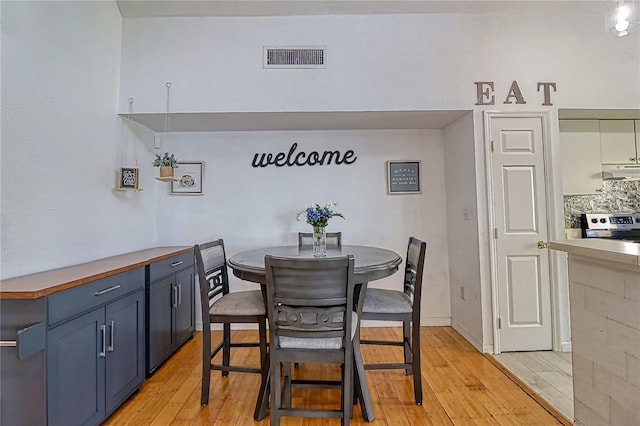 dining room featuring light hardwood / wood-style flooring