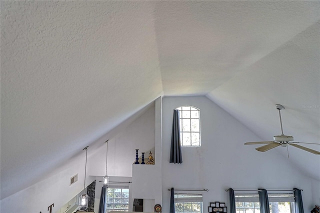 room details featuring a textured ceiling and ceiling fan