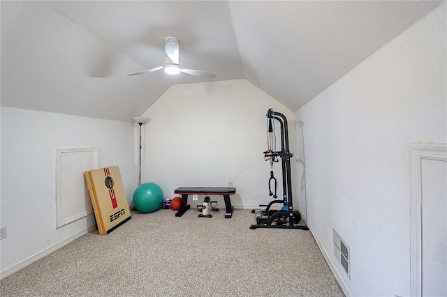 workout room featuring carpet floors, vaulted ceiling, and ceiling fan