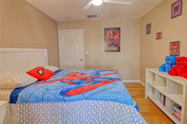 bedroom featuring ceiling fan and light wood-type flooring