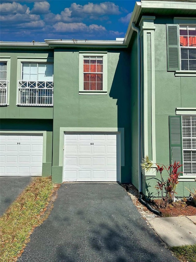 view of property exterior featuring a garage