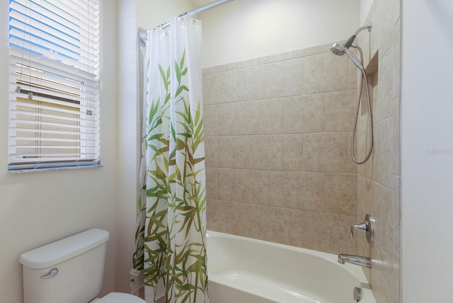 bathroom with toilet, a wealth of natural light, and shower / bath combination with curtain