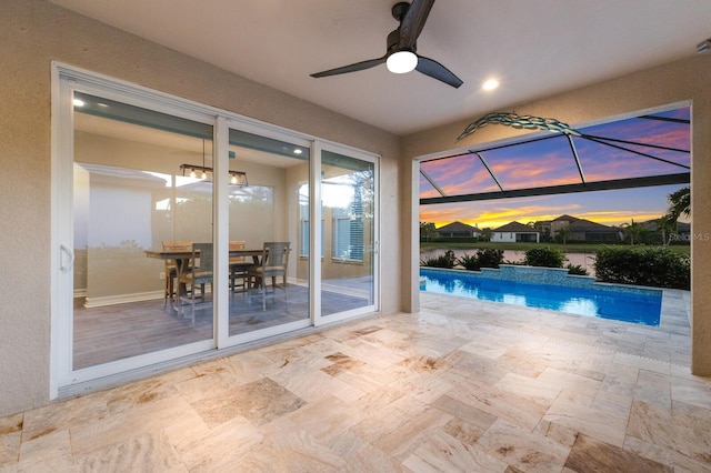 view of swimming pool with ceiling fan