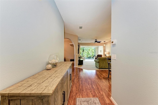 hallway featuring dark hardwood / wood-style floors