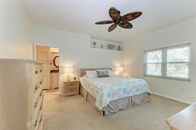 bedroom featuring light colored carpet and ceiling fan