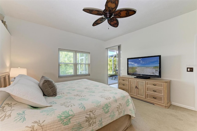 carpeted bedroom with access to outside and ceiling fan