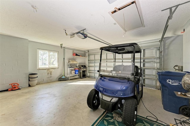 garage featuring a garage door opener