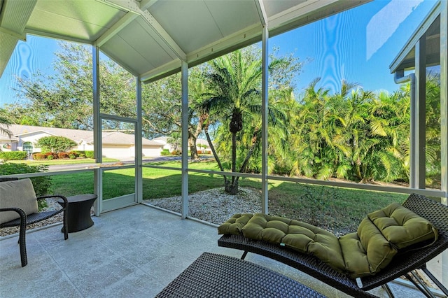 sunroom with lofted ceiling