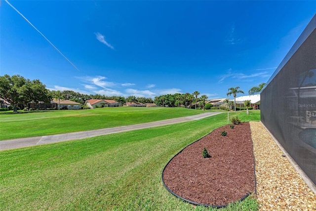 view of community featuring a yard