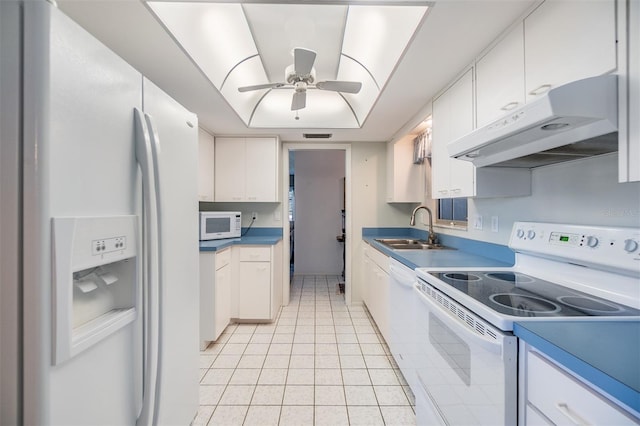 kitchen with white appliances, ceiling fan, sink, light tile patterned floors, and white cabinets