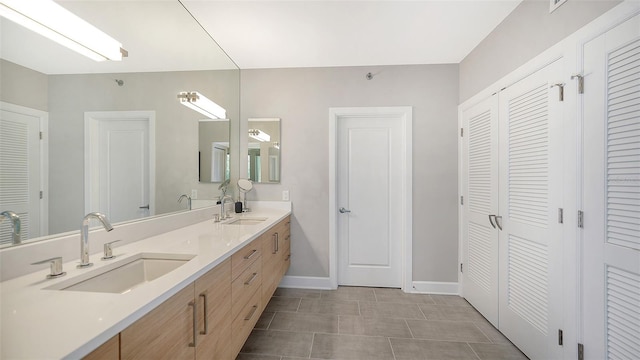 bathroom featuring vanity and tile patterned floors