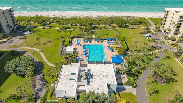 drone / aerial view with a view of the beach and a water view