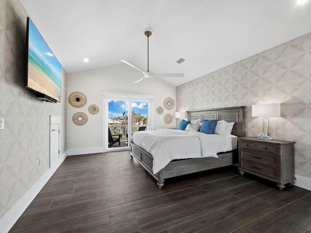 bedroom featuring access to exterior, vaulted ceiling, ceiling fan, and dark wood-type flooring